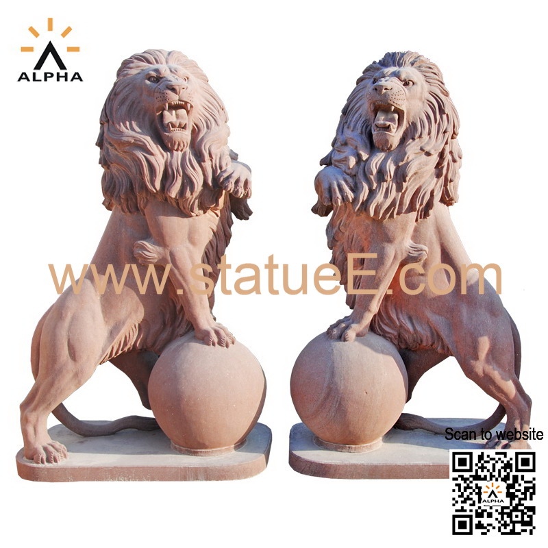Lion with ball statue